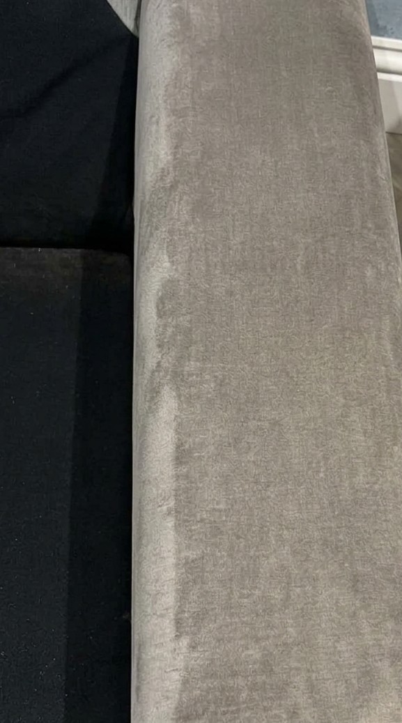 The same velvet sofa arm freshly cleaned beside a Christmas tree